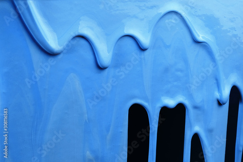 Blue paint covering blue background. Bright colored shot. Abstract . photo