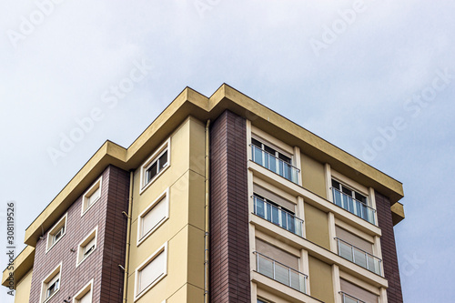 Bottom shoot of mass housing dark yellow facade color building