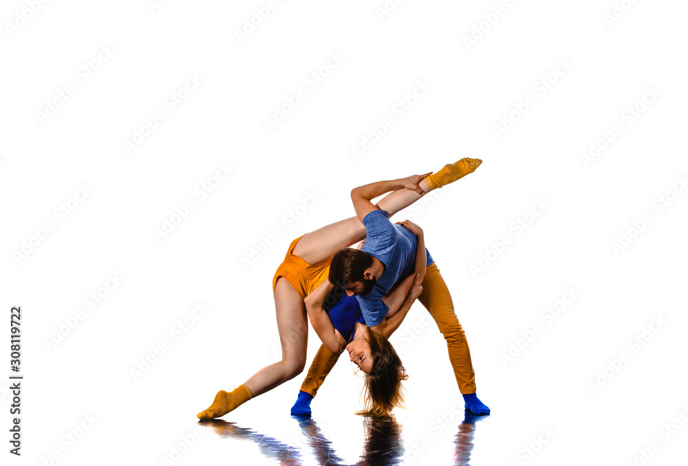 Pair of dancers isolated on the white wall