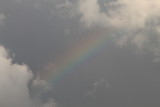 Rainbow in a cloudy sky.