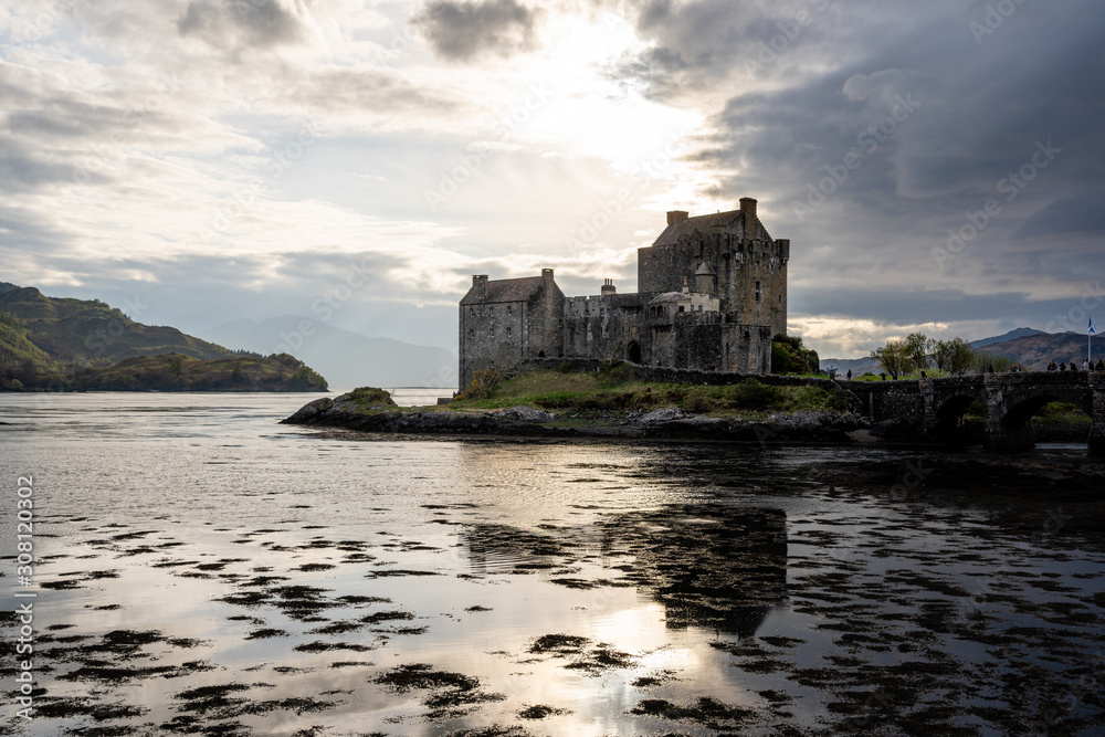 Eilean Donan castle sunset reflection water
