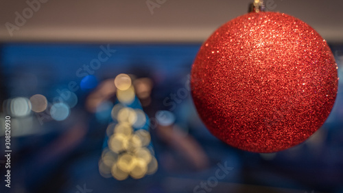 christmas shiny glitter red ball decoration close up