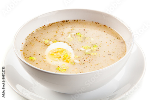  Sour rye soup on white background