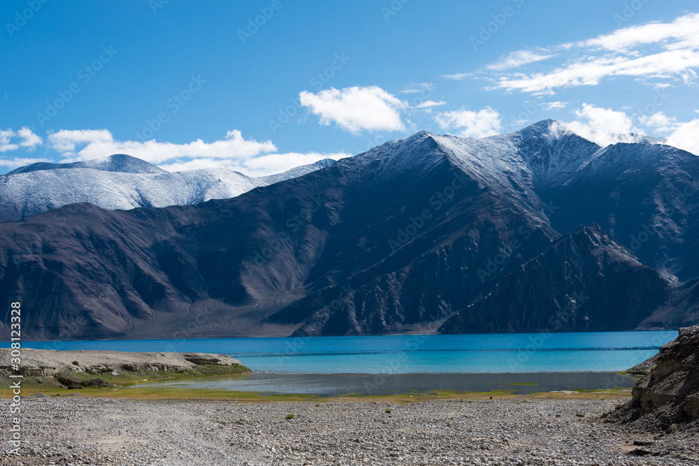 Ladakh, India - Aug 07 2019 - Pangong Lake view from Between Merak and Maan in Ladakh, Jammu and Kashmir, India. The Lake is an endorheic lake in the Himalayas situated at a height of about 4350m.