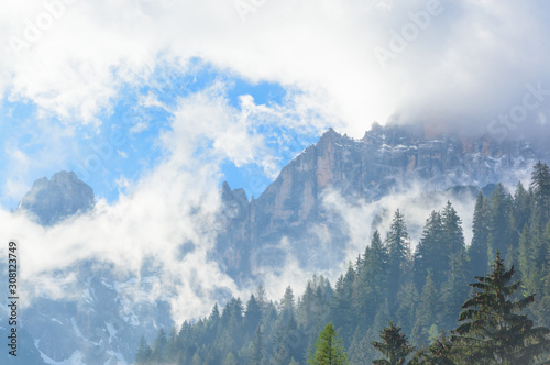 View with clouds over mountains in Dolomite