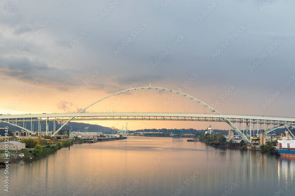 Fototapeta premium Fremont Bridge in Portland Oregon during a colorful sunset in summer time.