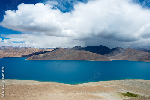 Ladakh, India - Aug 08 2019 - Pangong Lake view from Spangmik Village in Ladakh, Jammu and Kashmir, India. The Lake is an endorheic lake in the Himalayas situated at a height of about 4350m.