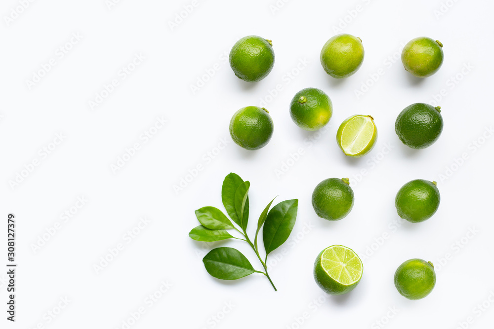 Fresh limes with leaves isolated on white Fresh limes with leaves isolated on white