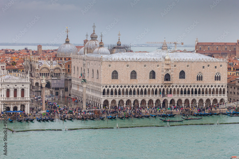 Aerial view of gondolas in front of Palazzo Ducale during high water, Venice, Italy