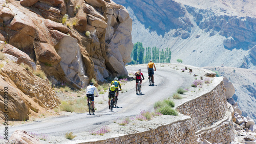 Ladakh, India - Aug 22 2019 - Cyclist at Sermangchan La Pass (Tsermangchan La Pass) 3897m view from Between Yangtang and Hemis Shukpachan in Sham Valley, Ladakh, Jammu and Kashmir, India.