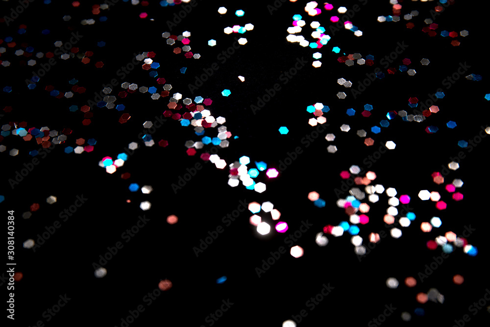 Black background with bright multicolor bokeh lights. Holiday, Christmas and New Year background. Ideal to layer with any design. Horizontal Black background with bright multicolor bokeh lights. Holiday, Christmas and New Year background. Ideal to layer with any design. Horizontal
