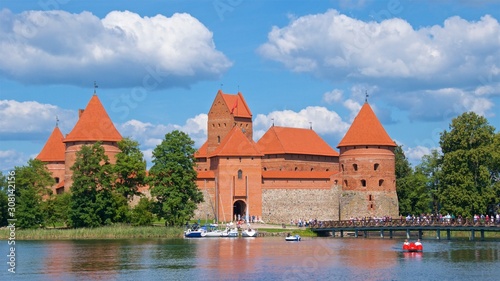 Tourists visiting Trakai Island Castle on Lake Galve in Trakai, Lithuania