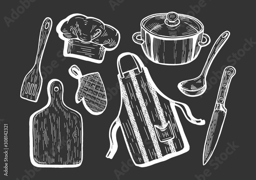 kitchen utensils on black background
