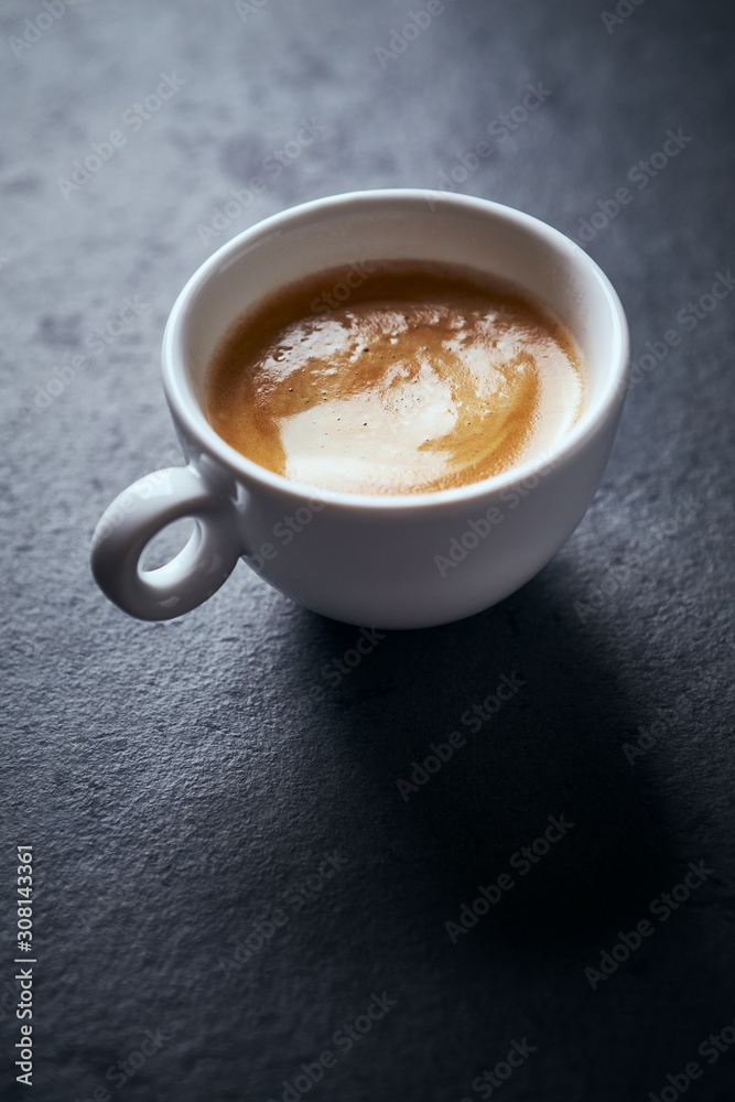 Cup of coffee on dark stone background. Copy space Cup of coffee on dark stone background. Copy space