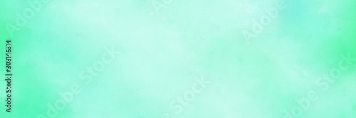 diffuse painted banner texture background with pale turquoise, aqua marine and turquoise color. can be used as texture, background element or wallpaper