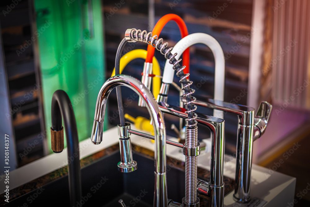 Multiple water taps in plumbing or hardware store showroom