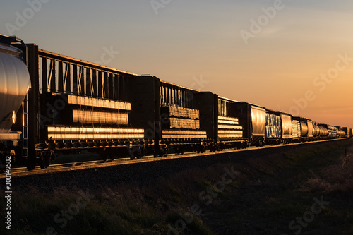 Train in Golden Sunset on the Canadian Prairie