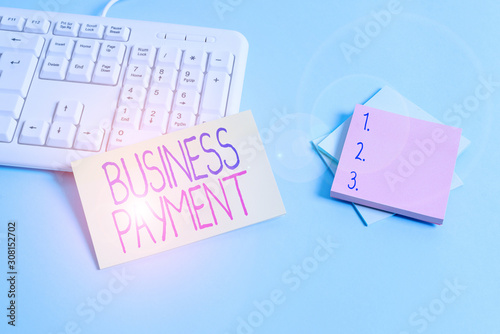 Text sign showing Business Payment. Business photo text trade of value from one party to another for goods Paper blue desk computer keyboard office study notebook chart numbers memo
