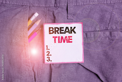 Writing note showing Break Time. Business concept for scheduled time when workers stop working for a brief period Writing equipment and blue note paper in pocket of trousers