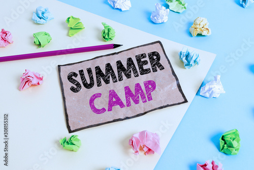 Handwriting text writing Summer Camp. Conceptual photo supervised program for children conducted during the summer Colored crumpled papers empty reminder blue yellow background clothespin