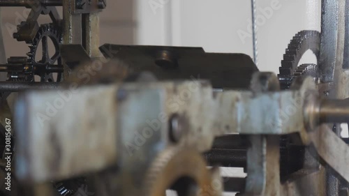 Part of church clock tower working mechanism, selective focus.
