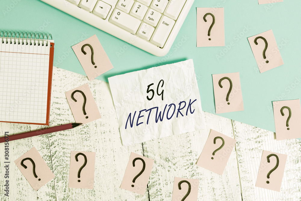 Handwriting text writing 5G Network. Conceptual photo greatly increase the speed and responsiveness of wireless network Writing tools, computer stuff and math book sheet on top of wooden table Handwriting text writing 5G Network. Conceptual photo greatly increase the speed and responsiveness of wireless network Writing tools, computer stuff and math book sheet on top of wooden table