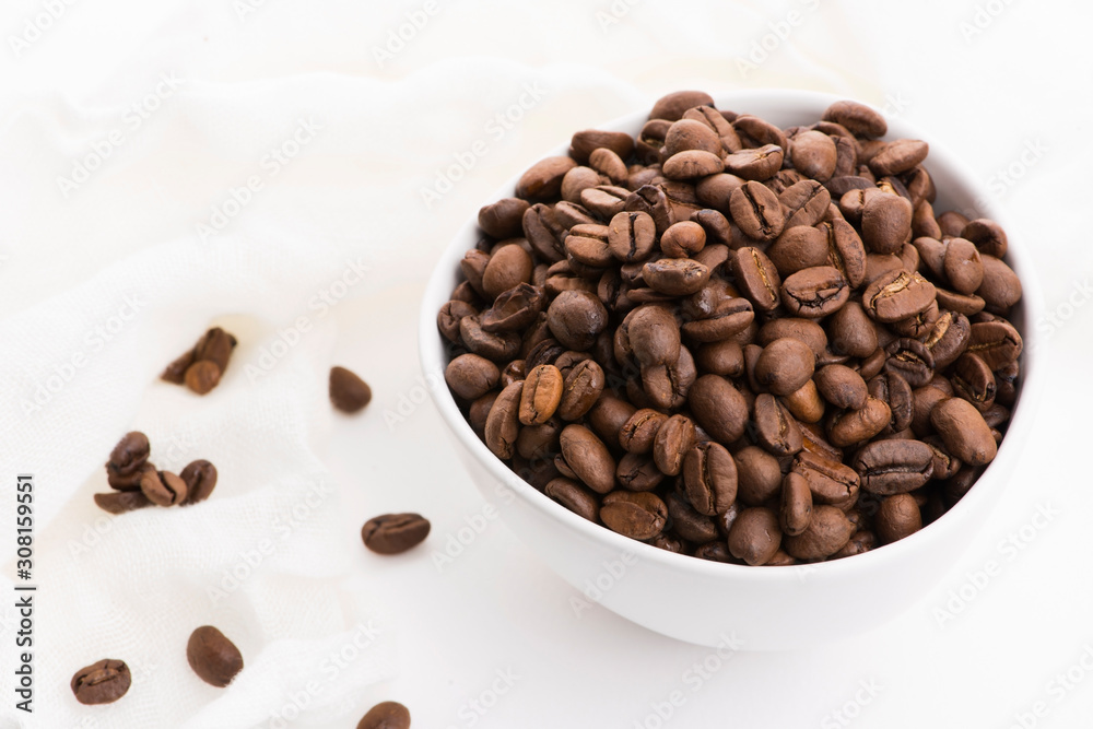 Bowl of caffee beans on a white background Bowl of caffee beans on a white background