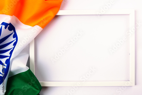 Indian republic day, flat lay top view, Indian tricolor flag and photo frame photo