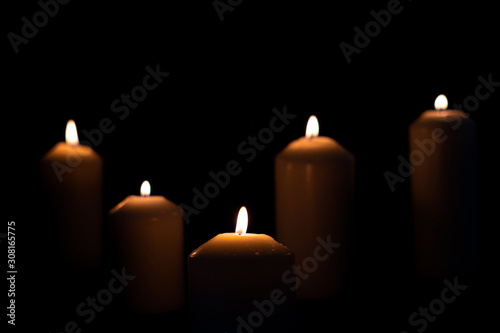 Five light flame candle burning brightly