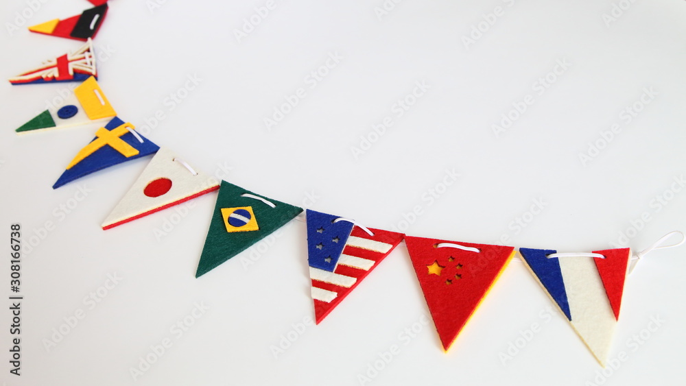 Obraz premium Handmade National Flags Garland on white
