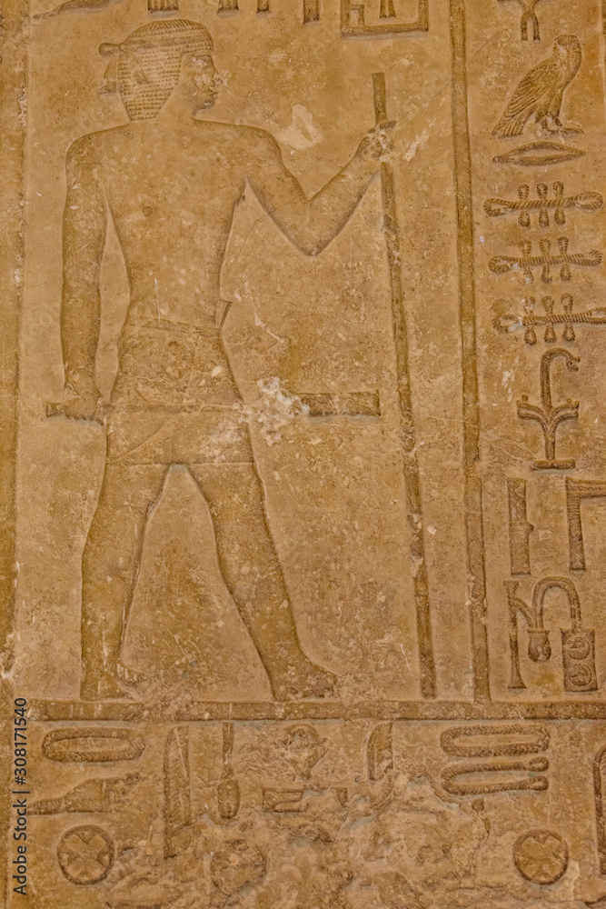 Fototapeta premium Egipskie starożytne hieroglify na kamiennej ścianie