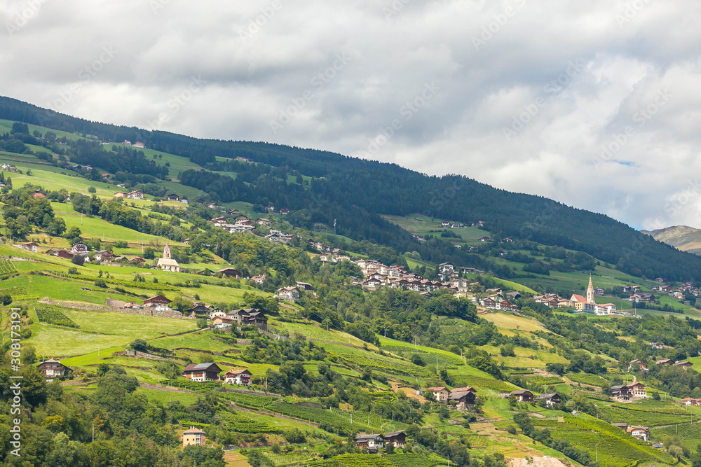 A village in the foothills of the Alps in Tyrol. A village in the foothills of the Alps in Tyrol.
