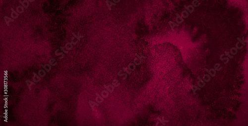 Dark saturated burgundy watercolor background with torn strokes and uneven spots. Trend color texture. Abstract background for design, layouts and patterns.