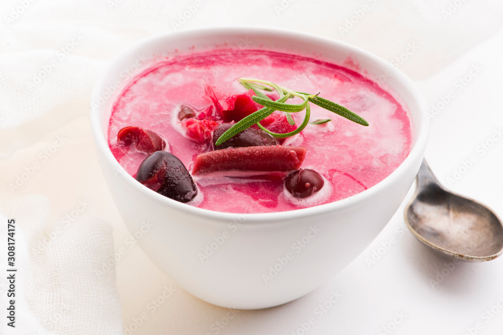 Beet root european soup called borscht with parsley Beet root european soup called borscht with parsley