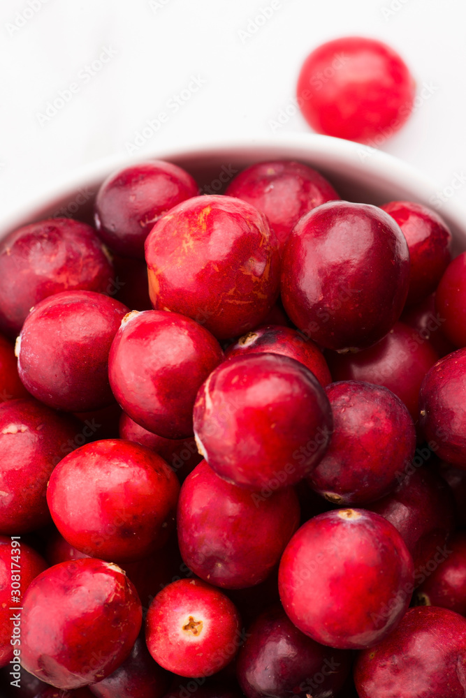 Ceramic bowl of Cranberry on white background Ceramic bowl of Cranberry on white background