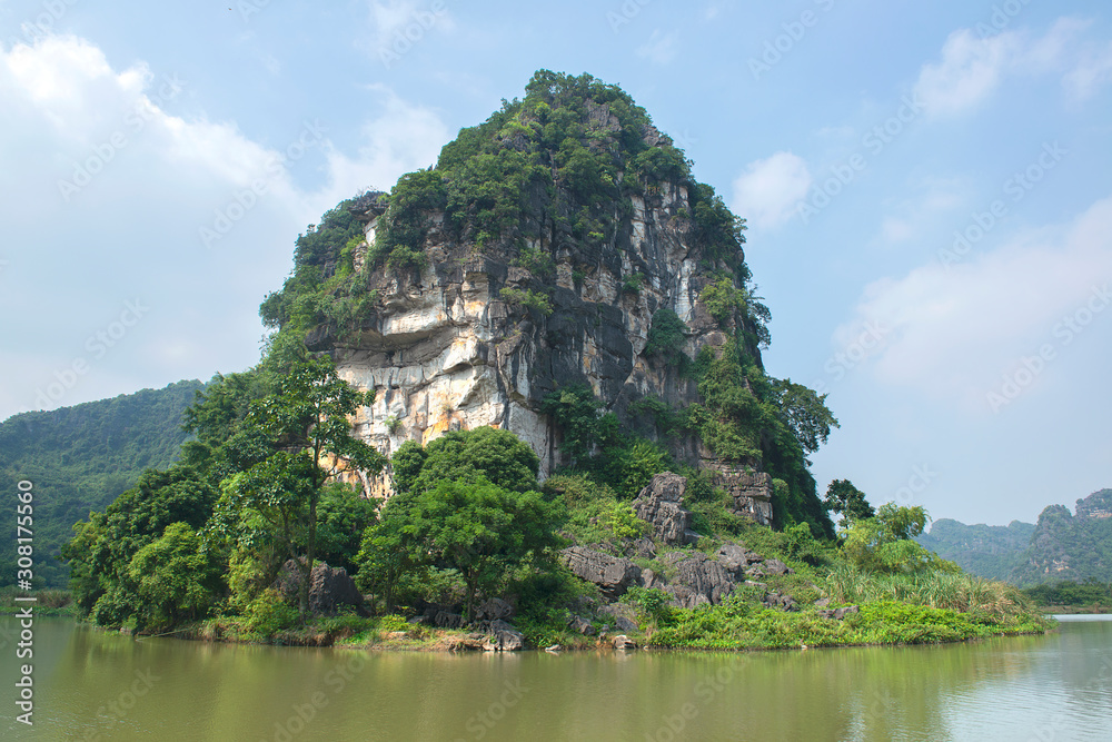 Panoramic view of karst formations  in Tam Coc, a part of Trang An Complex , was declared a UNESCO World Heritage Natural and Cultural Monument.Ninh Binh province, Vietnam