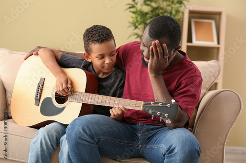 African American Father and...