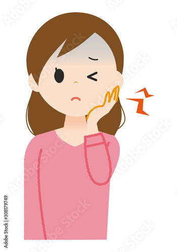 女性　歯が痛い　虫歯