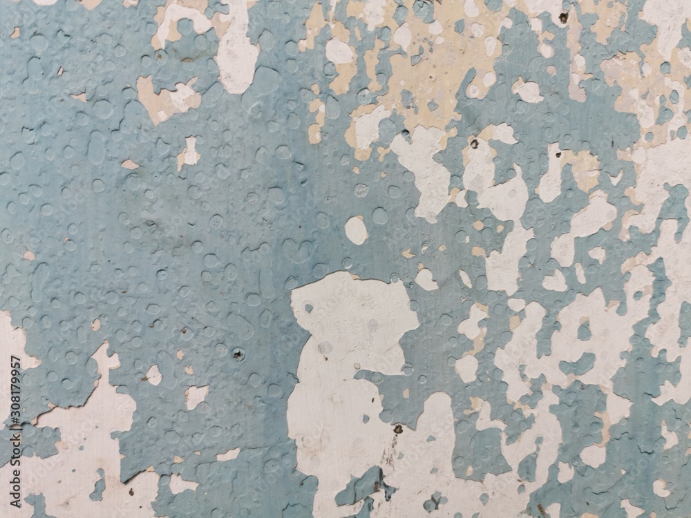 Rain water leaks on the wall causing damage. Peeling paint on wall seamless texture for background and wallpaper