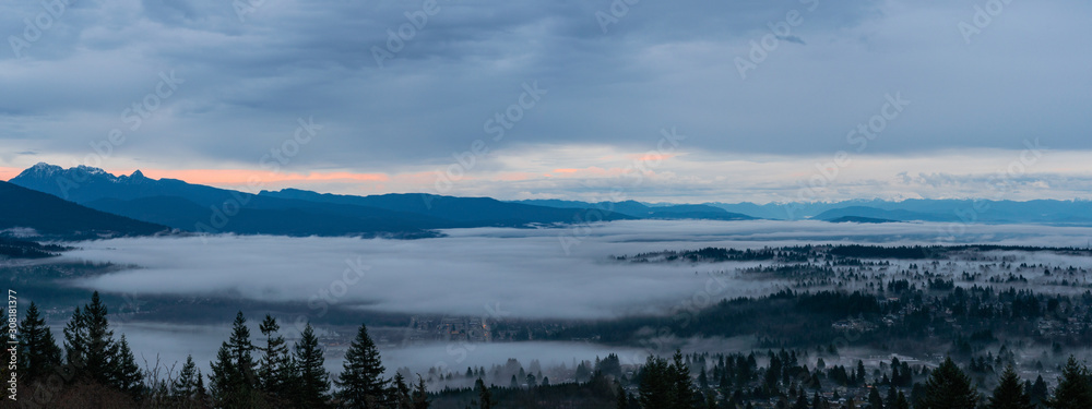 Mist-enshrouded Frser Valley panorama taken from UniverCity at dawn
