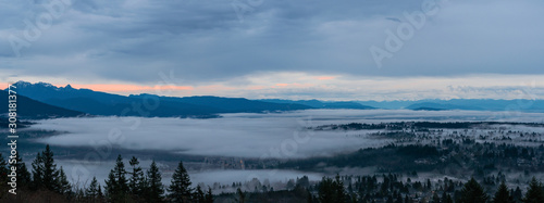 Mist-enshrouded Frser Valley panorama taken from UniverCity at dawn