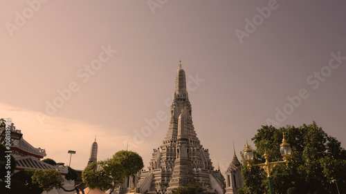 Beautiful Pagoda at Wat Arun Ratchawararam Ratchawaramahawihan, Wat Arun is a Buddhist riverside temple in Bangkok Thailand. photo