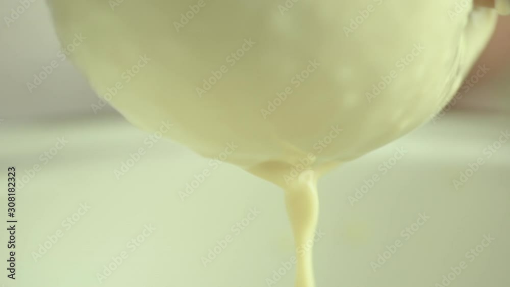 Preparation for making Tofu, squeezing soy milk out of blended soy bean.