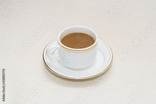 A cup of coffee or milk tea on the table