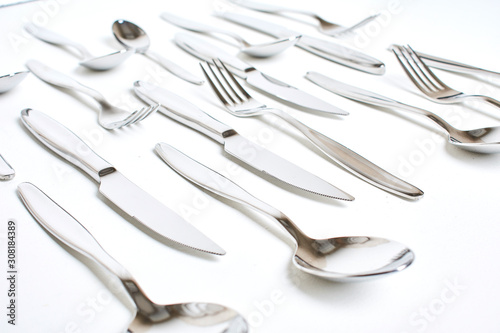 Kitchen knifes, spoons and forks. Cutlery