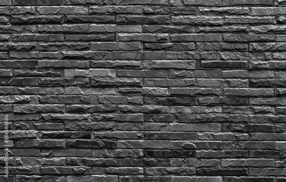 Old vintage retro style dark bricks wall background and texture.	