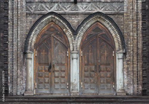 Old wooden doors of gothic cathedral