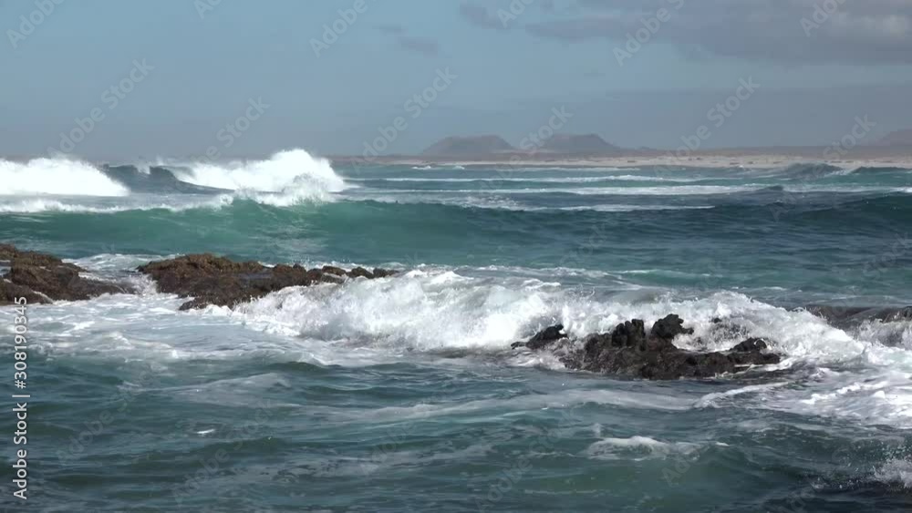 The power of the waves of the Atlantic Ocean breaking on the shore of the Canary Islands. The power of the waves of the Atlantic Ocean breaking on the shore of the Canary Islands.