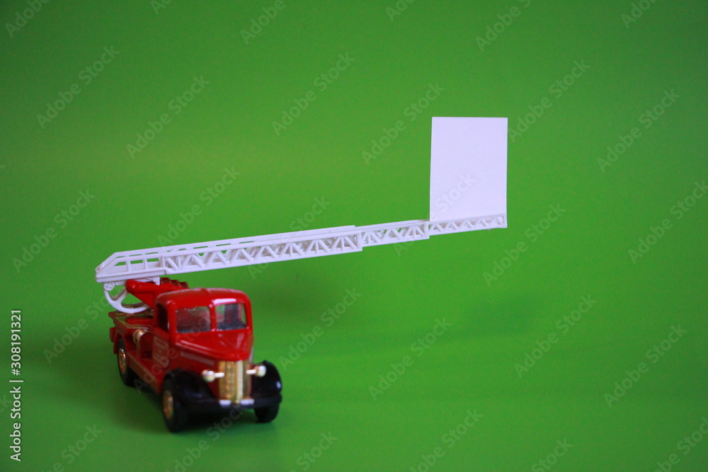 the red fire engine shows blank paper for text or message the red fire engine shows blank paper for text or message
