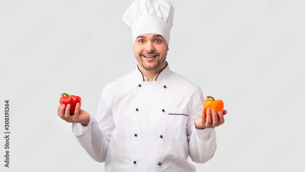 Smiling Chef Man Holding Sweet Peppers Over White Background, Panorama Smiling Chef Man Holding Sweet Peppers Over White Background, Panorama